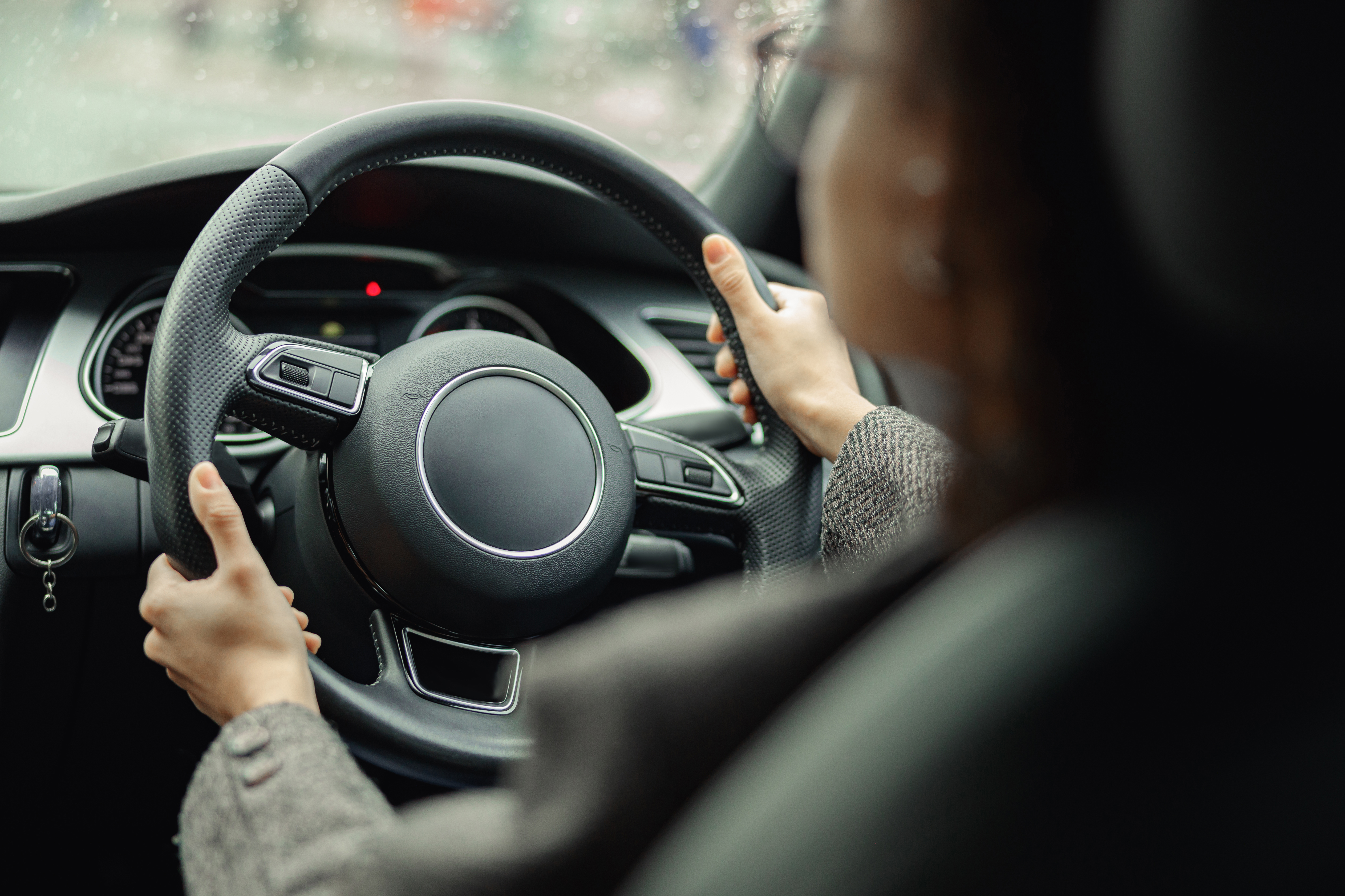 Someone driving a car