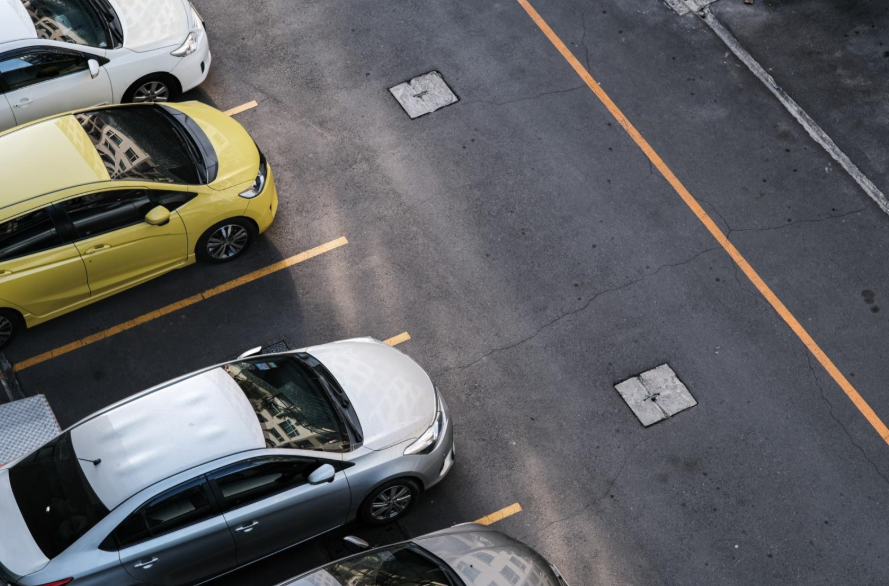 Aerial view colourful car parking lot in condominium resident transport background