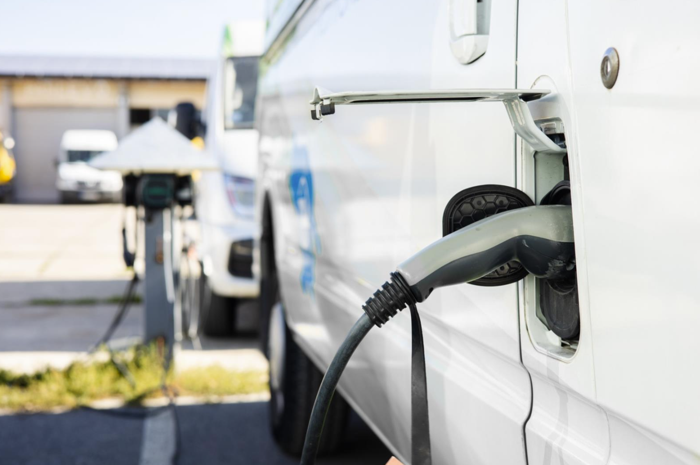 Close up shot of the plug-in electric vehicle charging