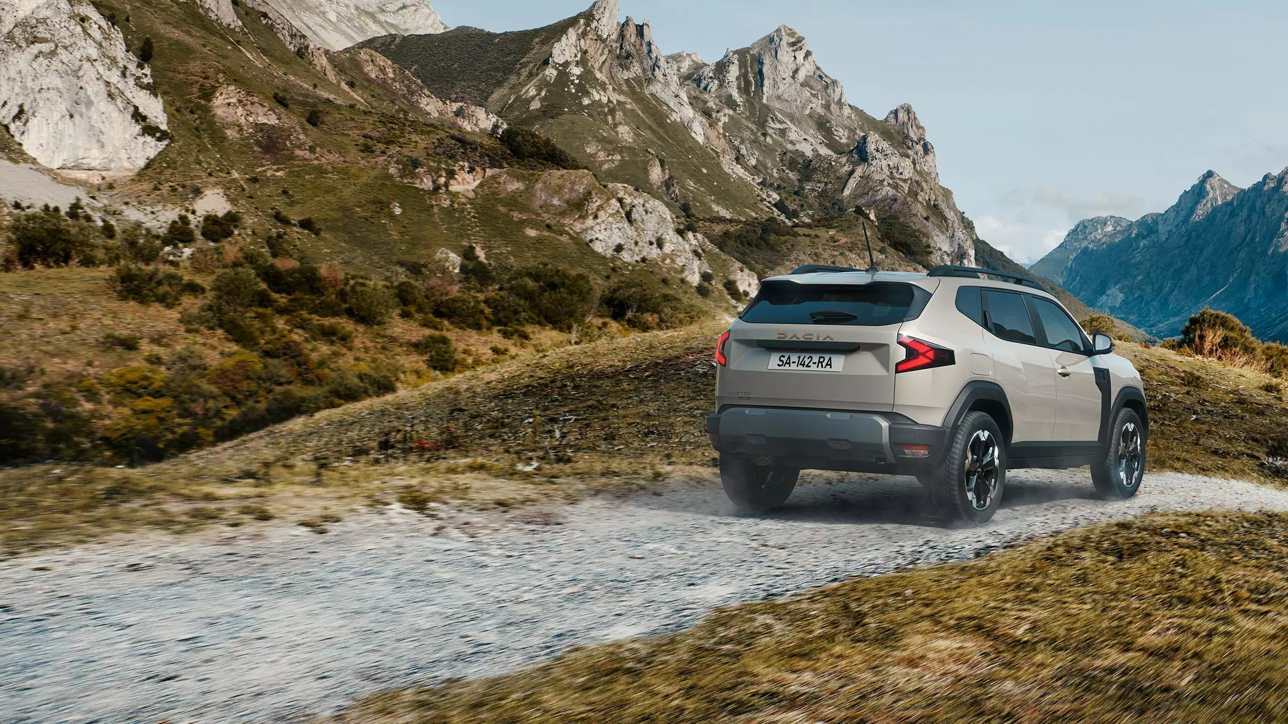 A Dacia Duster car off-roading in the mountains