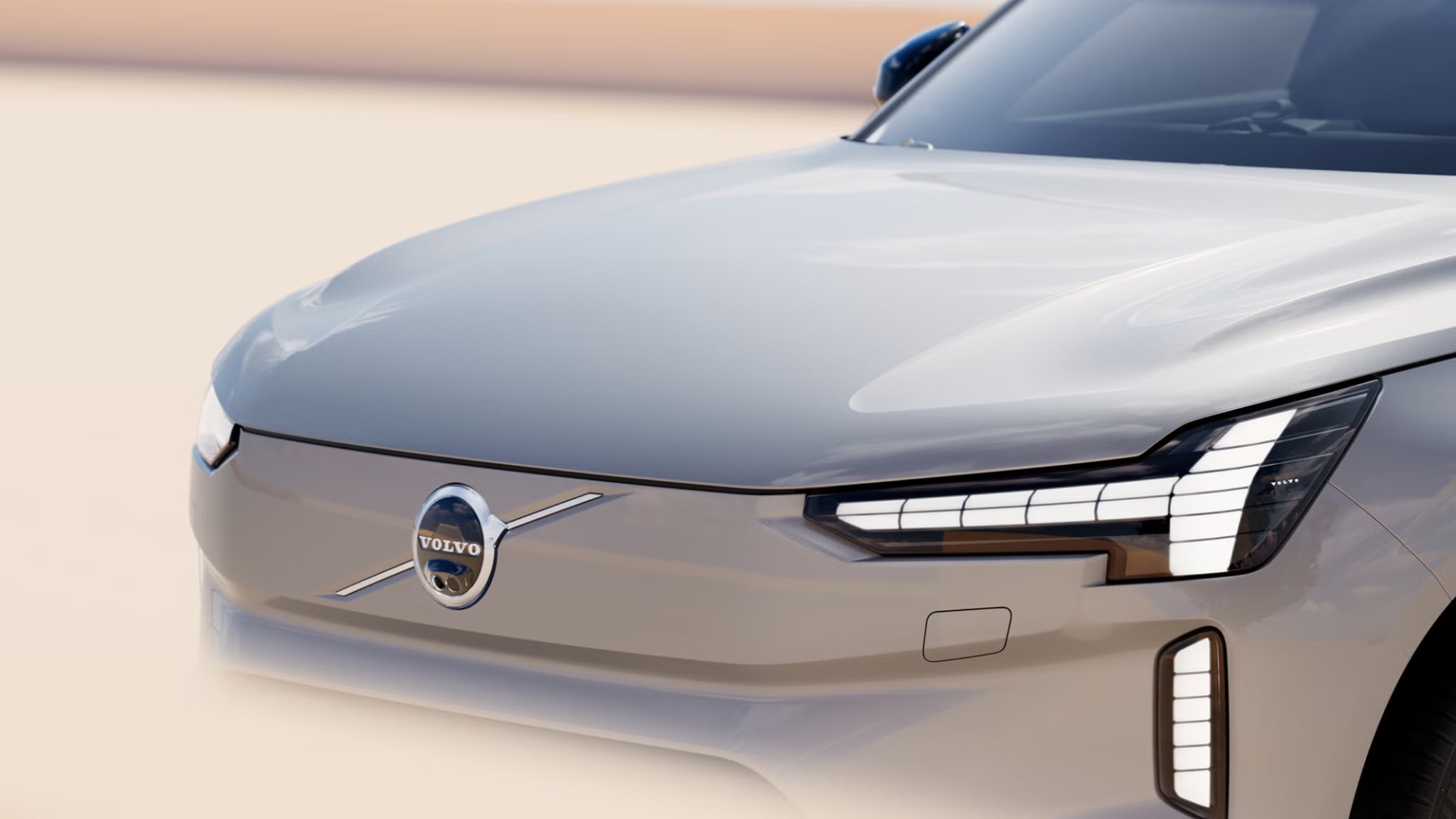 close up image of the front of a grey Volvo EX90 electric vehicle