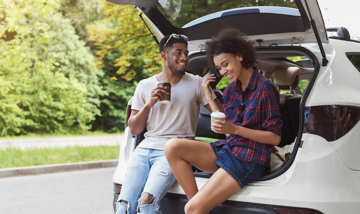 couple sitting in boot