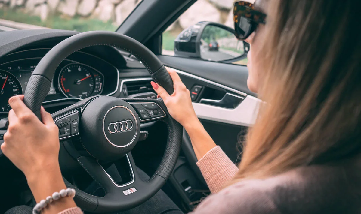 lady driving a lease car