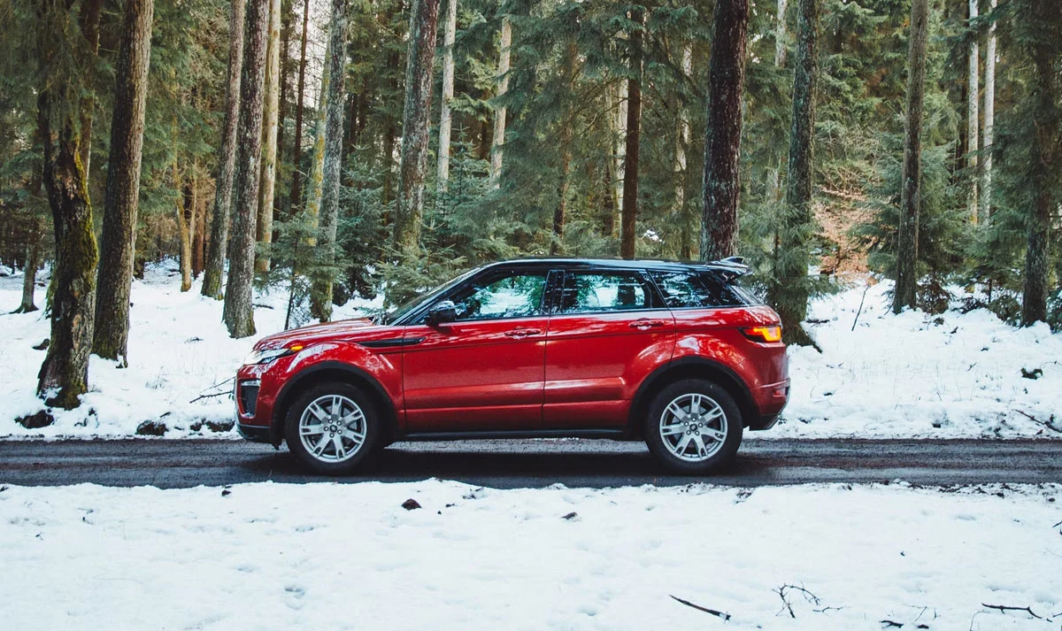 suv driving in snow