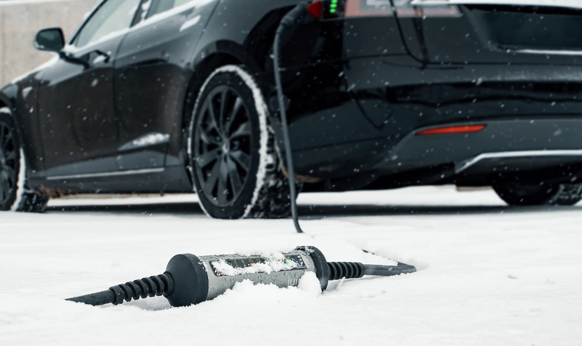 electric car charging in the snow