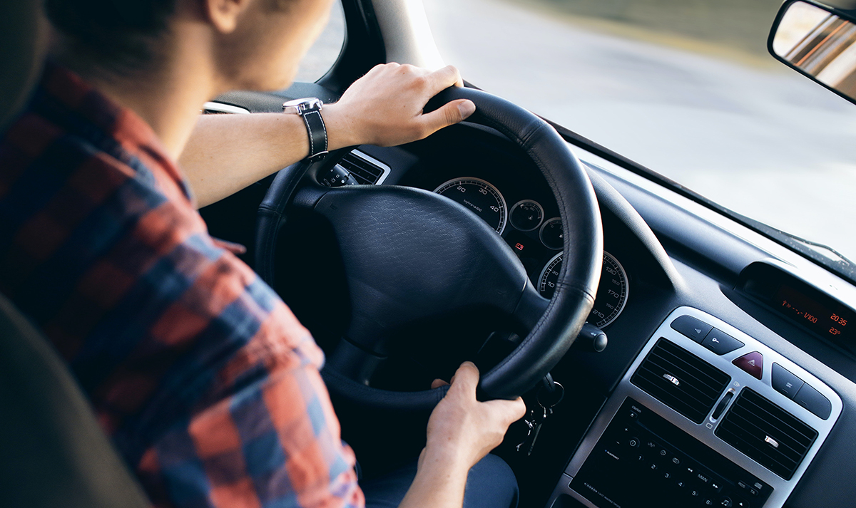 person driving a car